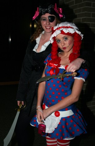Freshmen Ana Chinnes and Andrea Roberts dressed as a pirate and Raggedy Anne for the Carn-Evil event Oct. 28.