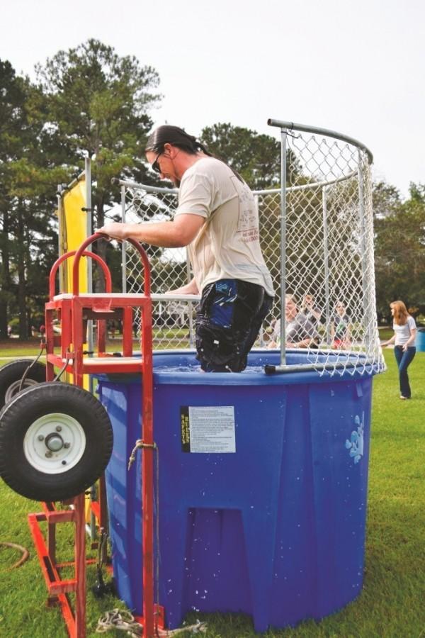 Alive in Christ dunks professors for charity
