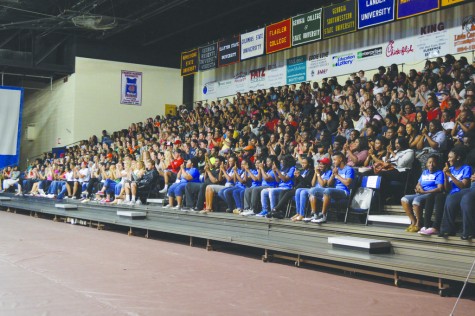 Student volunteers and audience members participate in the annual hypnotist show. John Greene, the hypnotist, gave the volunteers various instructions and the audience sat in awe as the volunteers subconsciously obeyed Greene's commands. 