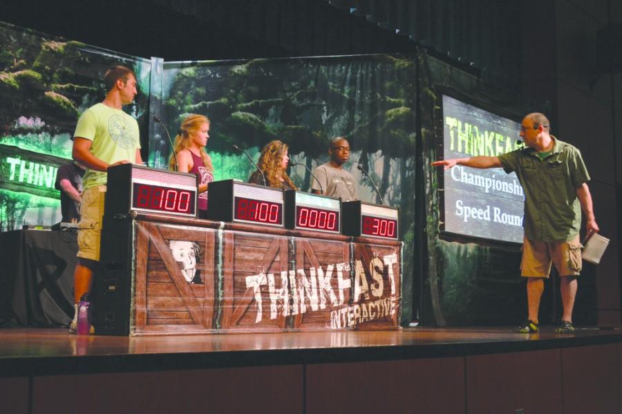 Students participate in the Think Fast Game Show. Jimmy Carter, Be a Wach, McKayla Parker and Kalil Johnson compete to answer questions and earn points for their teams.