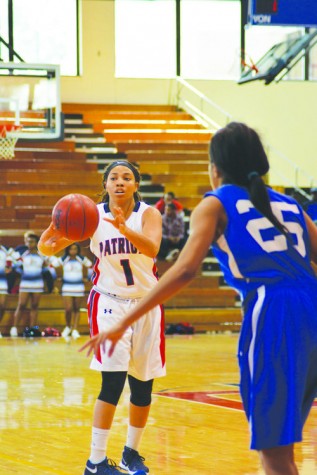 Junior Victoria Dye passes the ball to a teammate during the Jan. 30 game against Georgia College.