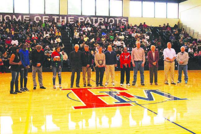 The FMU Athletic Department inducts 1992 graduates Mary Jackson and Michael Colaiacovo,
surrounded by previous inductees, to the FMU Hall of Fame during the Homecoming basketball games.