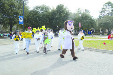 The American Chemical Society (ACS) marches during the Homecoming parade representing the Disney movie "Flubber." 