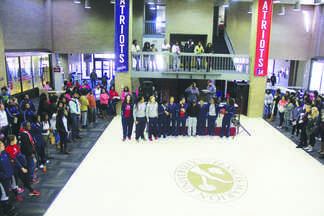 The FMU Athletic Department announces the women’s basketball team during the pep rally. Students
gather together to celebrate the basketball teams for Homecoming.