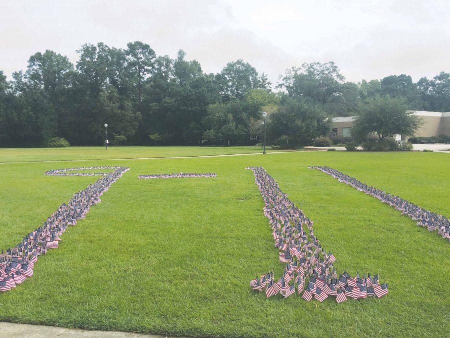 Kappa Alpha Order visually commemorated the lives lost in the Sept. 11, 2001 terrorist attack by placing 2,977 American flags on the academic quad lawn.