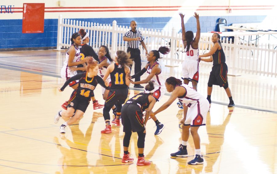 The women’s basketball team attempts to prevent Flagler from maintaining possession of the ball.