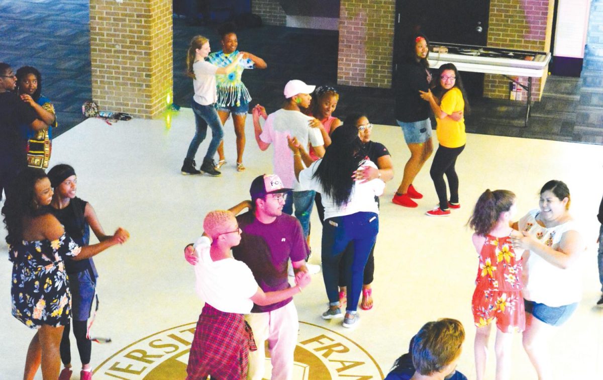 Students learn to salsa dance during the Salsa Magic event to celebrate Hispanic Heritage Month.