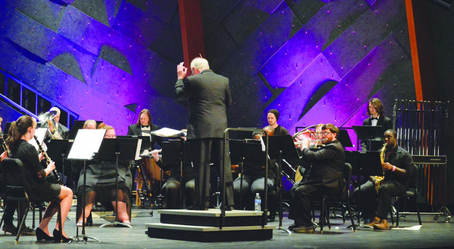 The FMU Concert Band performs a Halloween-themed concert with pieces from