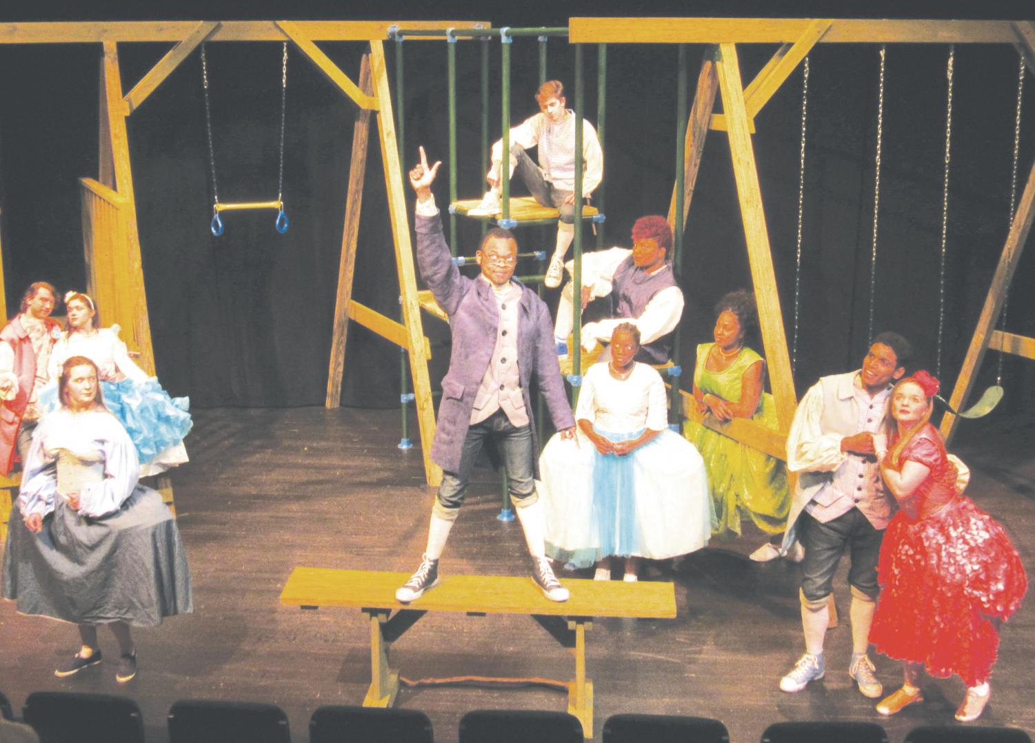 The set design features a playground to show that adult problems are similar to children's problems.