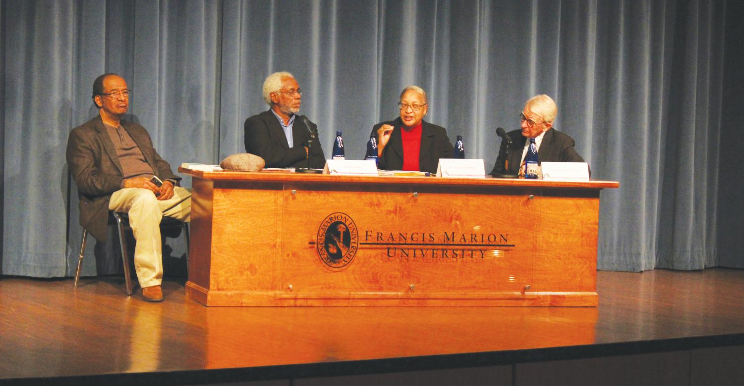 Panelists Herb Frazier, Valinda Littlefield and Joe Riley discuss Cleveland Sellar’s discussion on race, culture and education on Feb. 28. Audience members asked panelists questions after the event.