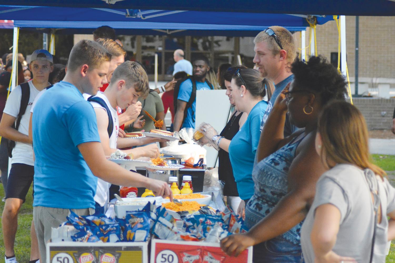 Students waited in line to build friendships and hot dogs at the cookout hosted by BCM outside of Smith University Center (UC) on Aug. 21.