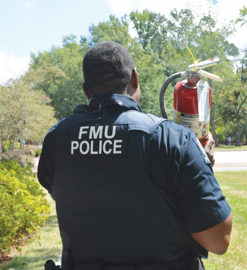 Student Resident Assistants learn important fire safety from FMU Campus Police and Florence County Firefighters. 