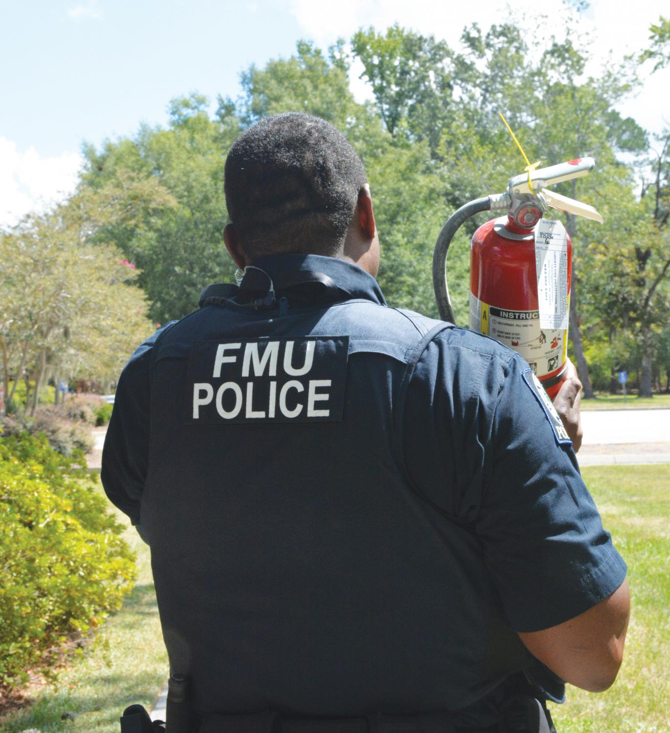 Student Resident Assistants learn important fire safety from FMU Campus Police and Florence County Firefighters.