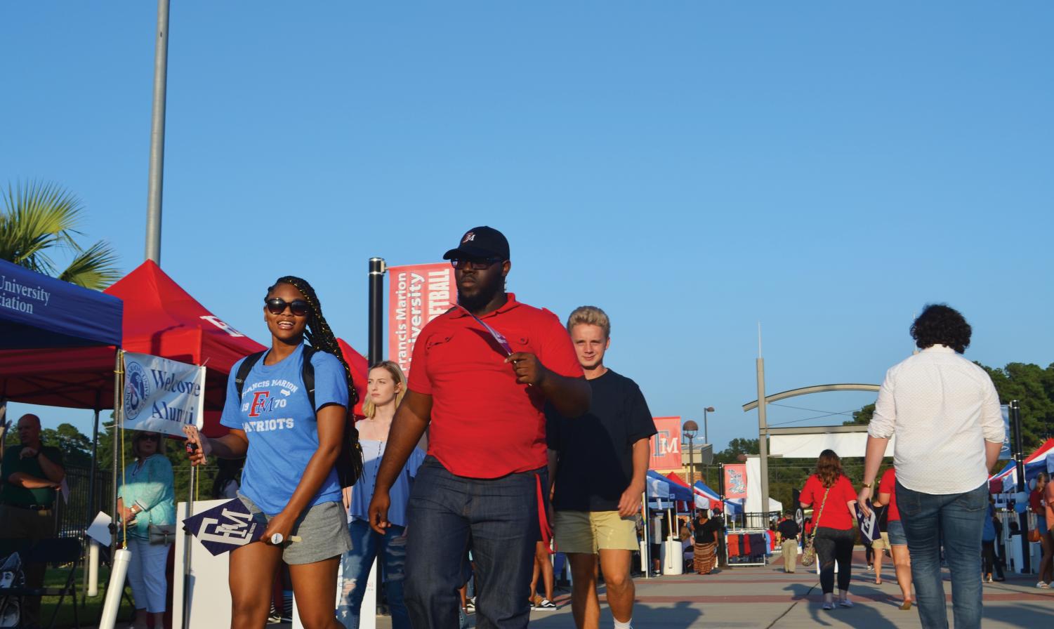 Students and alumni learn more about student organizations on campus, enjoy live music and reconnect with friends at the Griffin Athletic Complex during the First Friday event on Aug. 24.
