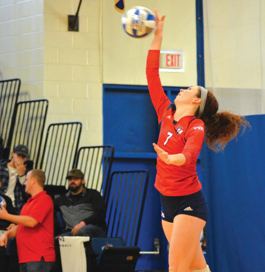 Georgia Garrison spikes the ball for the Lady Patriots during a match against Flagler College on Oct. 6, 2017.
