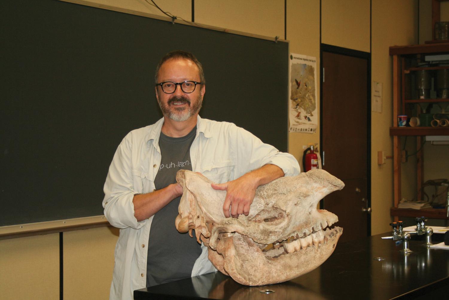 Travis Knowles, assistant professor of biology, works with universities across the world to do research at WildSumaco, a biological station that he co-founded.