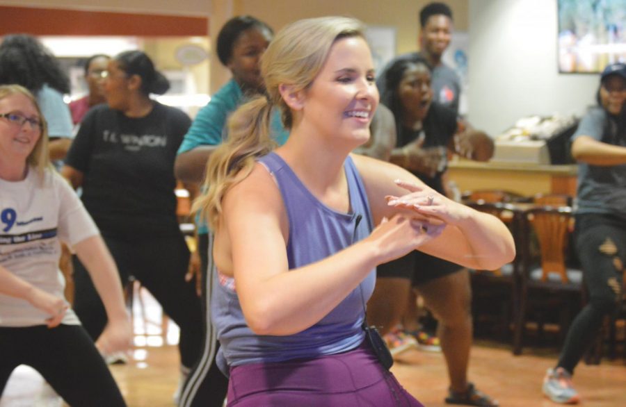 FMU Alumnu Taylor Gray teaches a two hour Zumba class for FMU students at the Grille on Sept. 24 with her sister, Reagan, for current FMU students. 