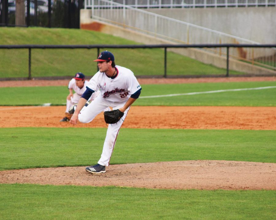 Christian Umphlett pitches at the April 13 game against Columbus State University. 