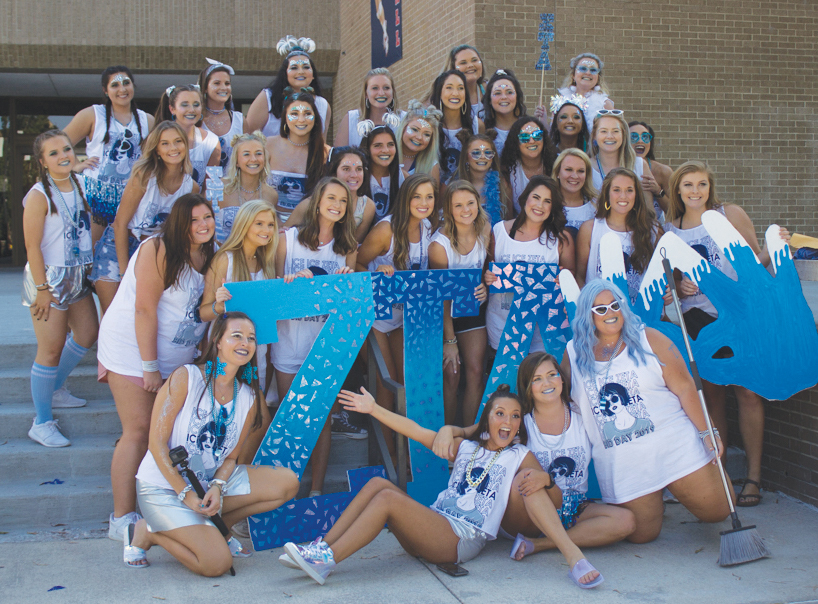 Zetas potential members run home and pose with their sisters. 