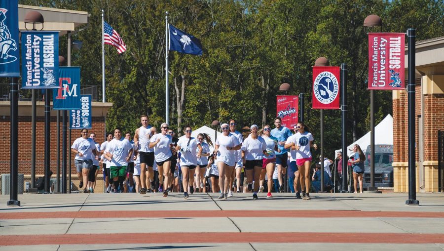 Ready, set, go! FMU students and faculty begin the color run at the Griffin Athletic Complex. 