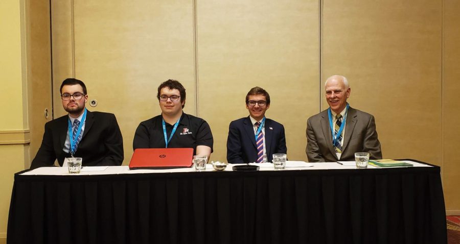 From left to right: Micheal Krasuski, Tyler Zeh, Samuel Day and Stephen Carls from different universities participate in a panel. 