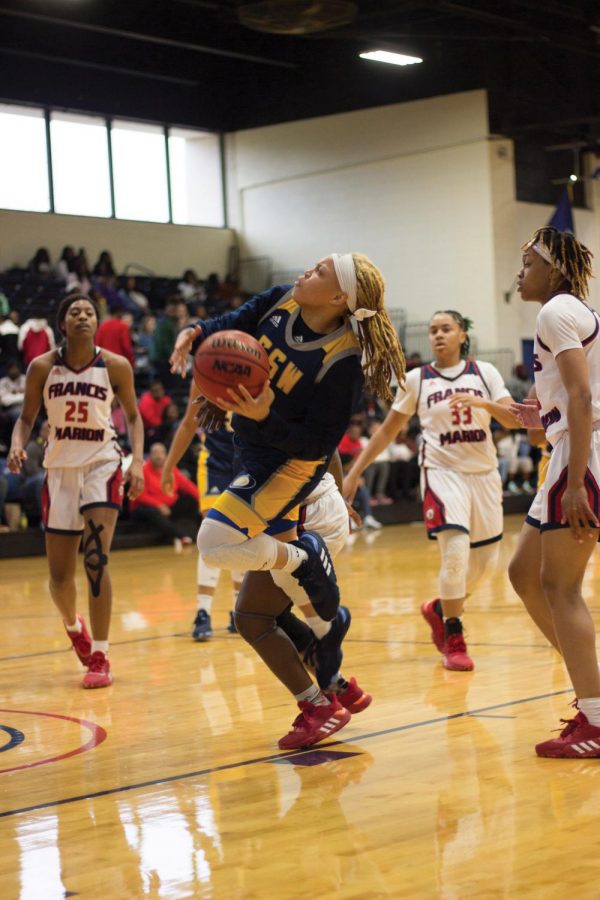 Womens basketball team defends against Georgia Southwestern. 