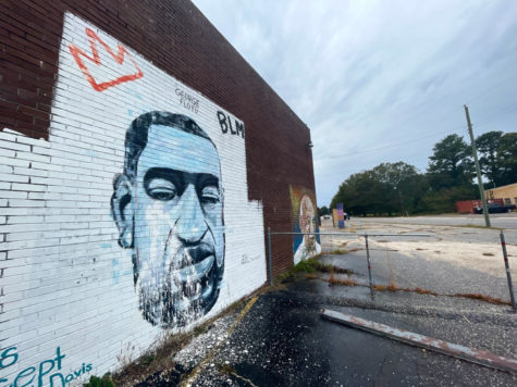 A mural of George Floyd lies on the side of an abandoned building in Downtown Florence. 