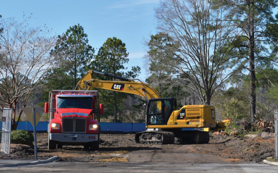 FMU rips up asphalt in the UC parking lot to begin construction on new building.