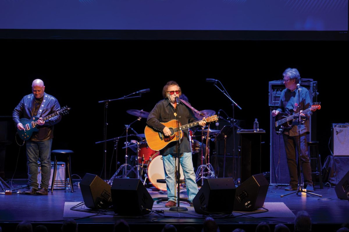 Don McLean sings and plays guitar for PAC attendants.