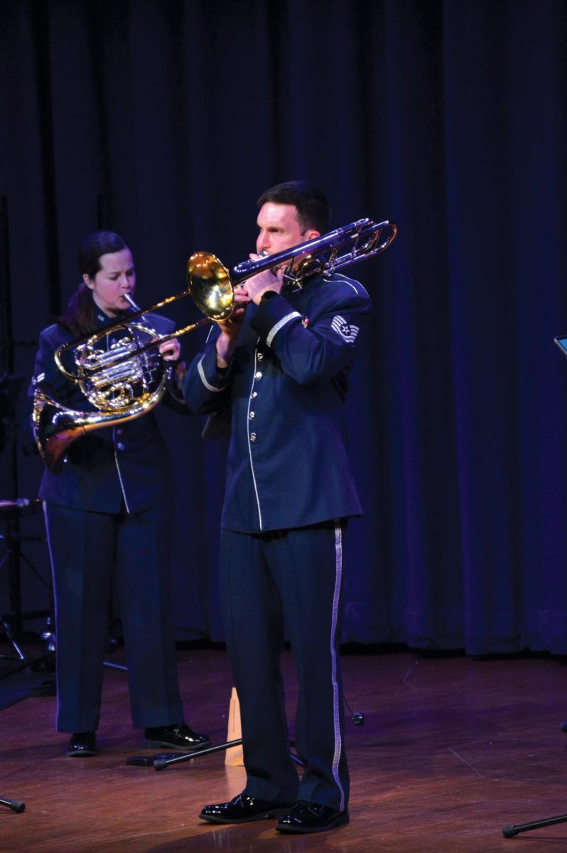 The Air Force Heritage Band plays for a student audience.