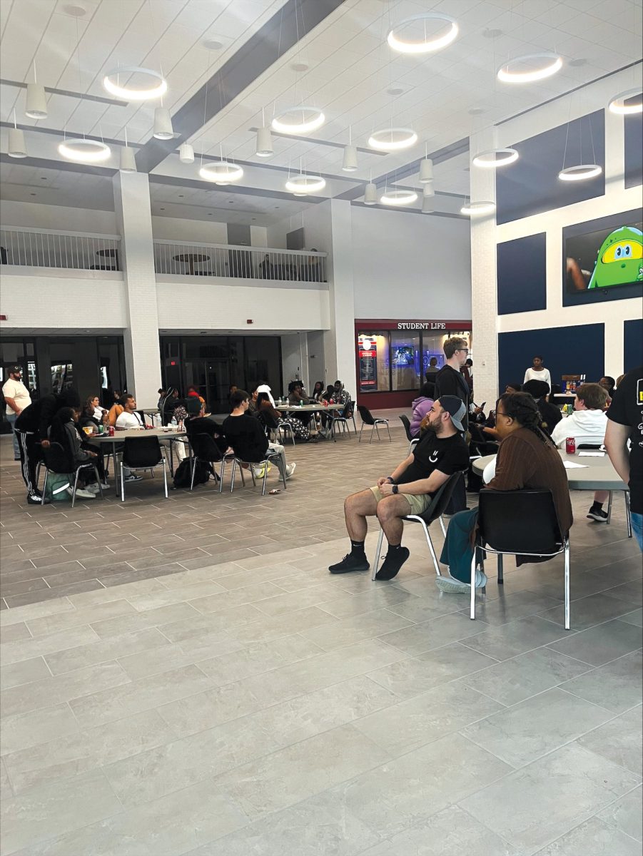 Students eagerly watch the Super Bowl in the newly renovated UC.