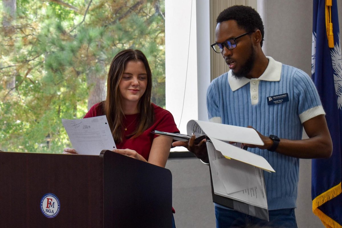 Student Body Vice President Taylor Causey (left) and Student Body President Isaiah Davis (right) preparing to present their agenda for the senate meeting on Sept. 11, 2025.