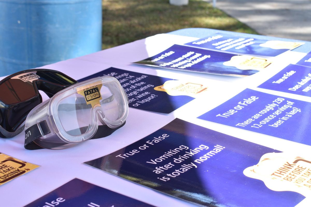 Information is displayed during Alcohol Awareness Week's "Pedal Car Obstacle Course" (Oct. 2, 2025).